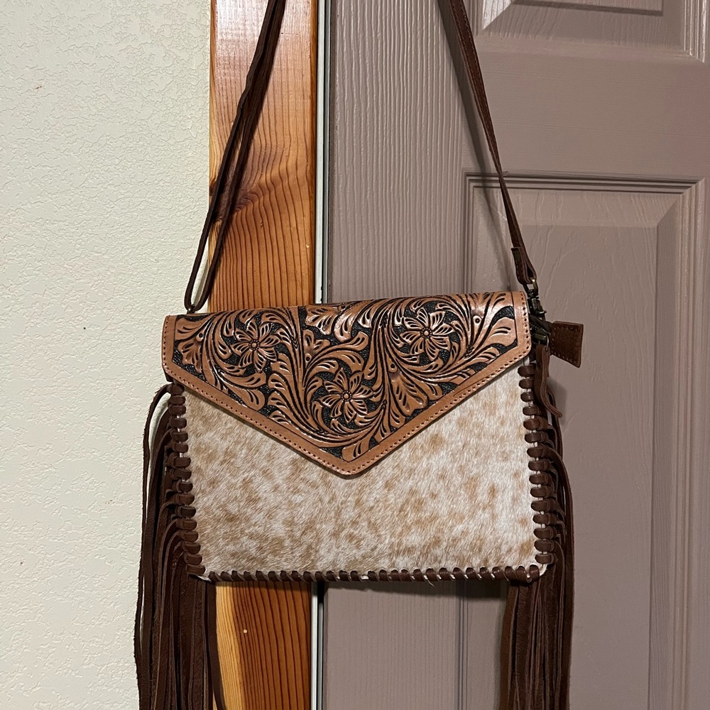 American Darling purse light tan/white with brown leather strap, fringe, & back